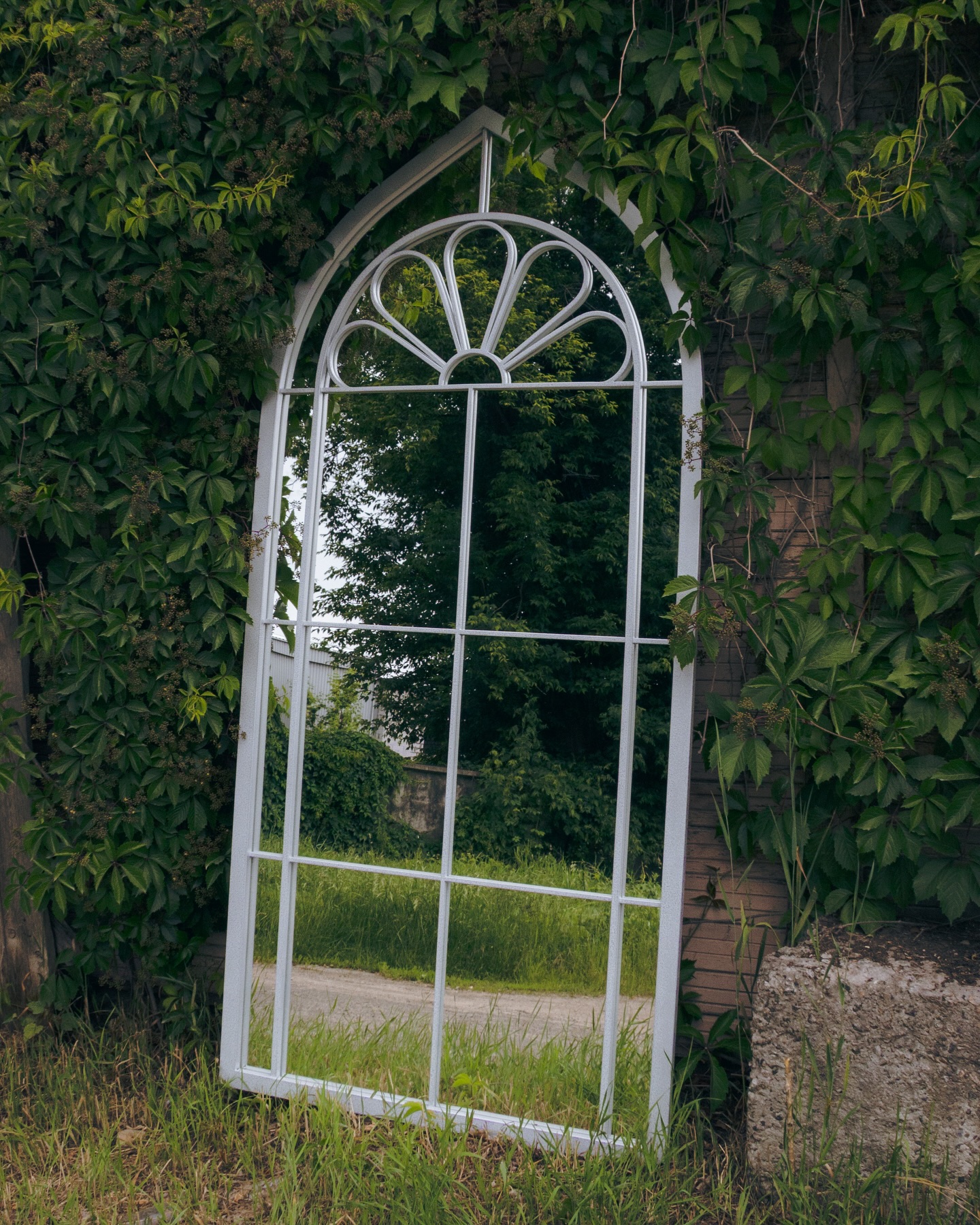 The Mirror Atelier custom steel framed mirror showcase