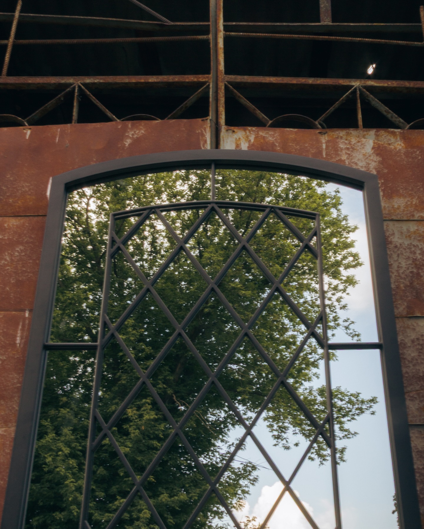 Handmade architectural mirror panel with steel grid