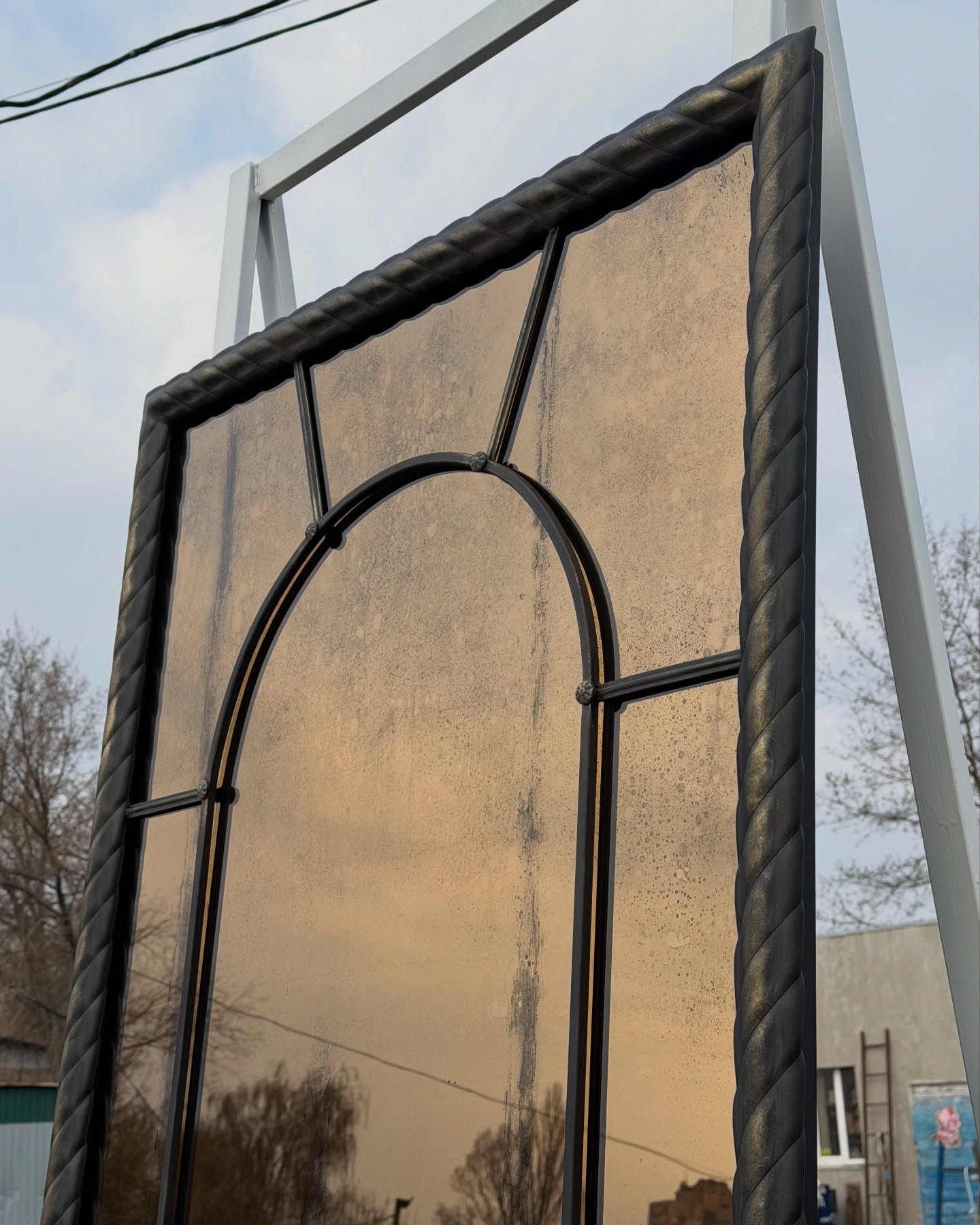 Decorative black steel mirror for restaurant wall installation