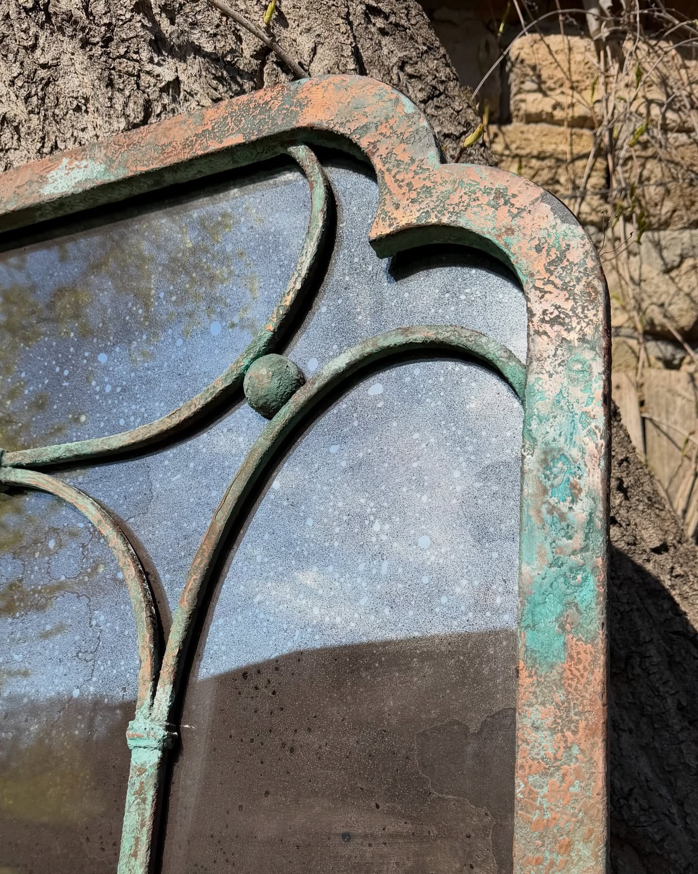Architectural steel mirror with custom geometric steel divisions